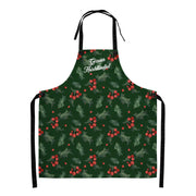 Albanian Gëzuar Krishtlindjet Christmas apron with green holly pattern.