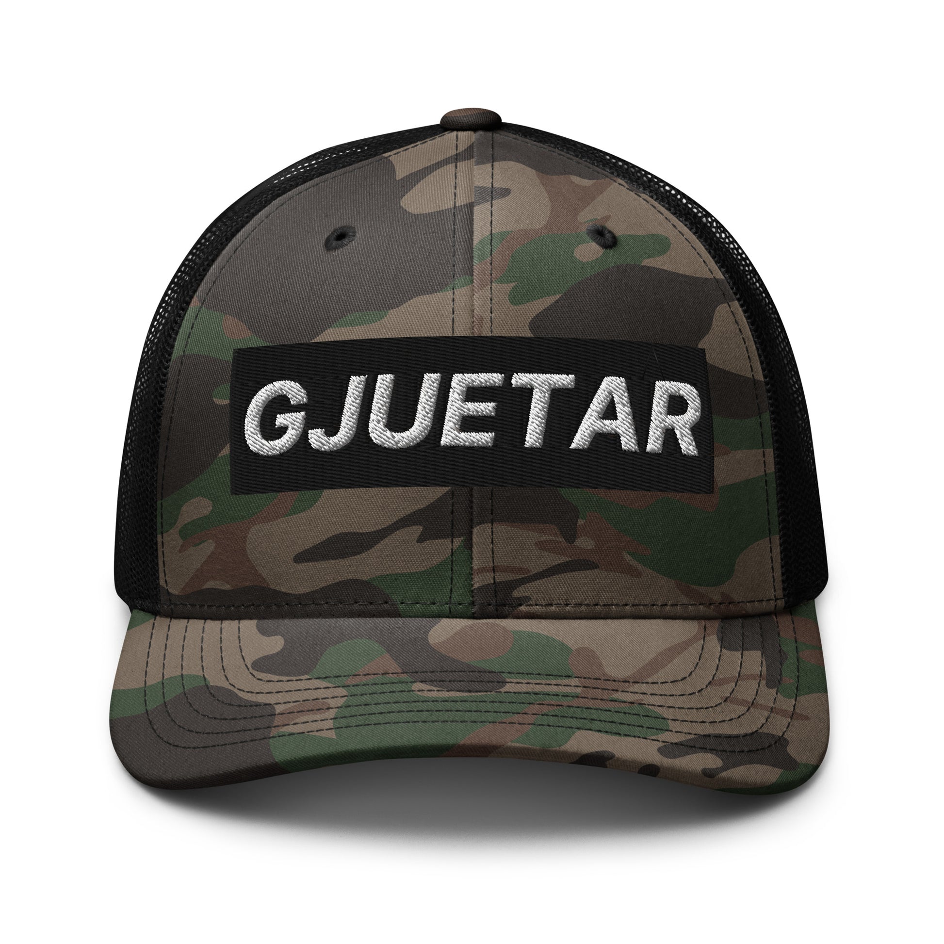Albanian Gjuetar camouflage trucker hat with embroidered white lettering and black mesh back