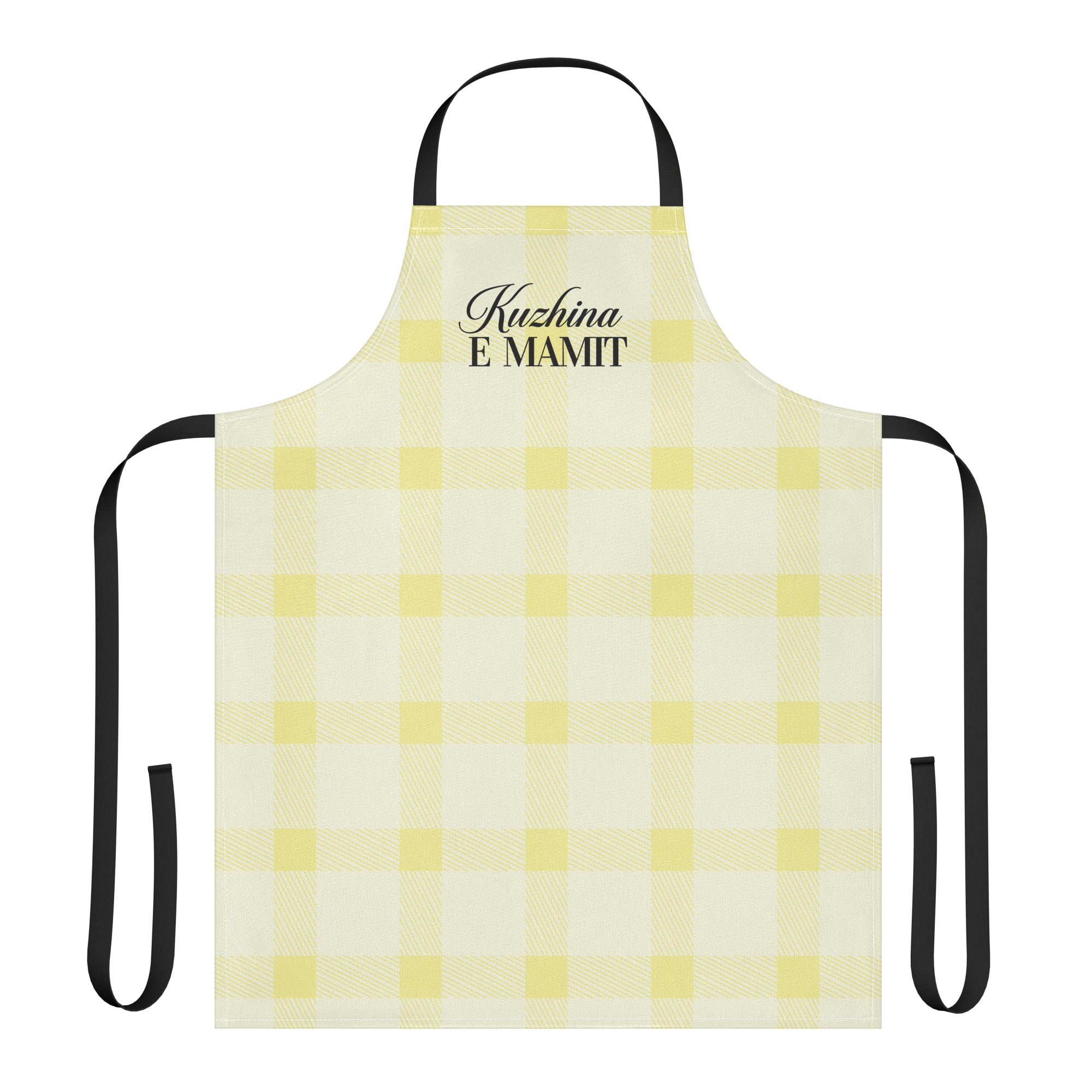 Yellow gingham apron with the phrase “Kuzhina e Mamit” printed at the top.