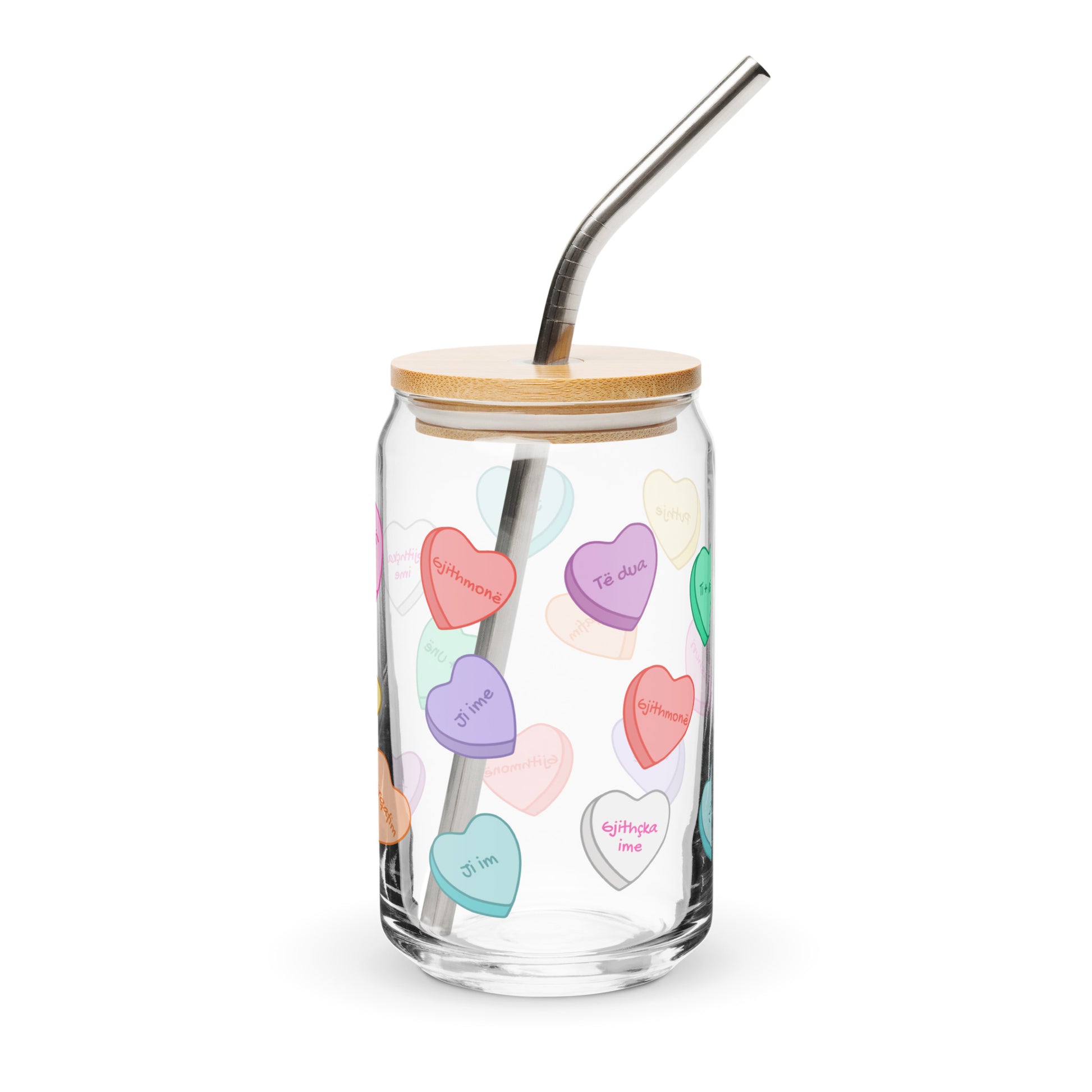 Glass can cup with sweetheart-style candy hearts and romantic phrases.
