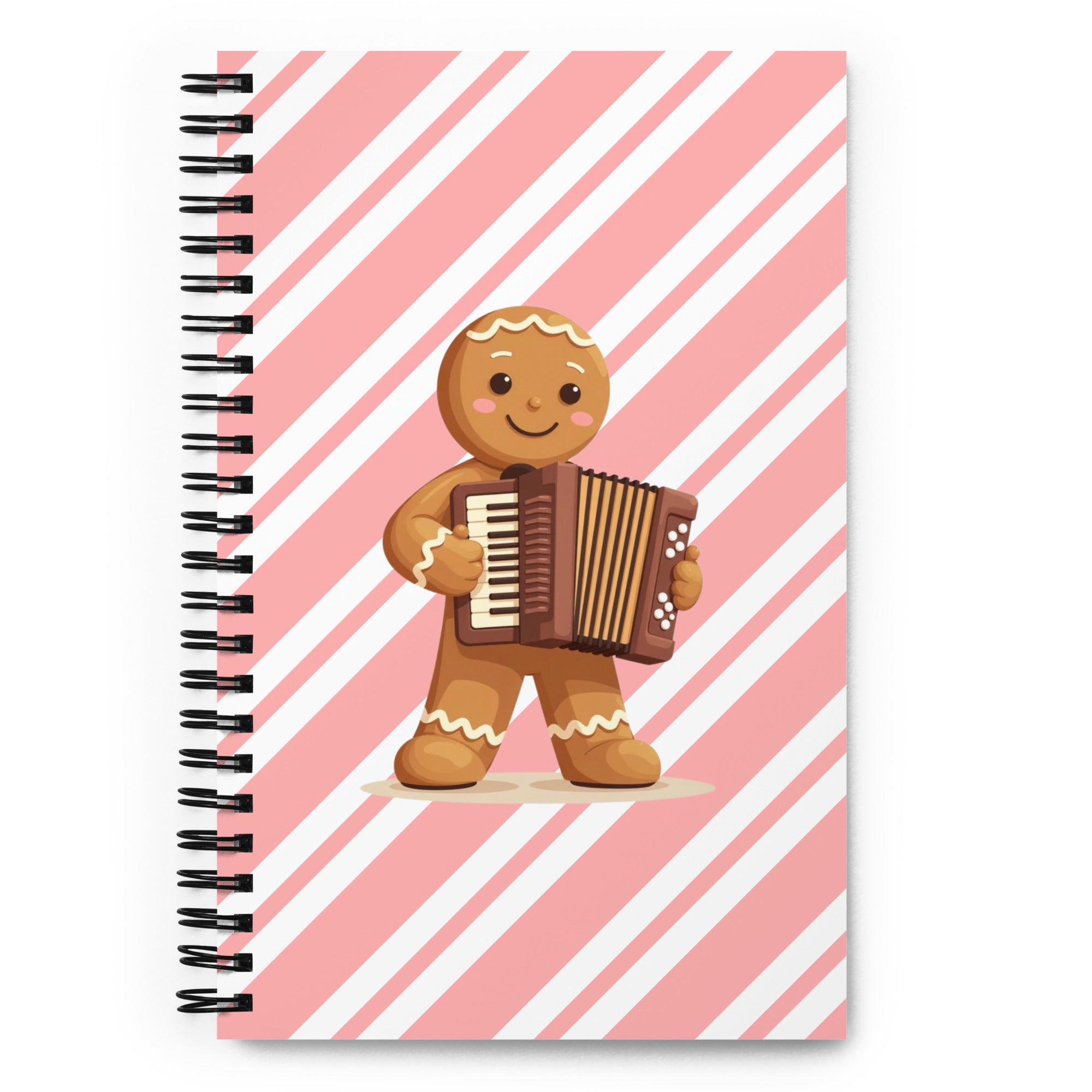 Balkan Christmas dotted notebook with gingerbread accordion character on pink striped background — cute holiday stationery by Balkanish