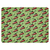 Green sherpa blanket featuring red Yugo cars carrying Christmas trees — Balkan Christmas design