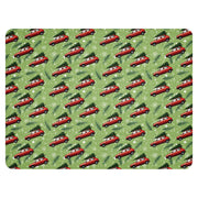 Green sherpa blanket featuring red Yugo cars carrying Christmas trees — Balkan Christmas design