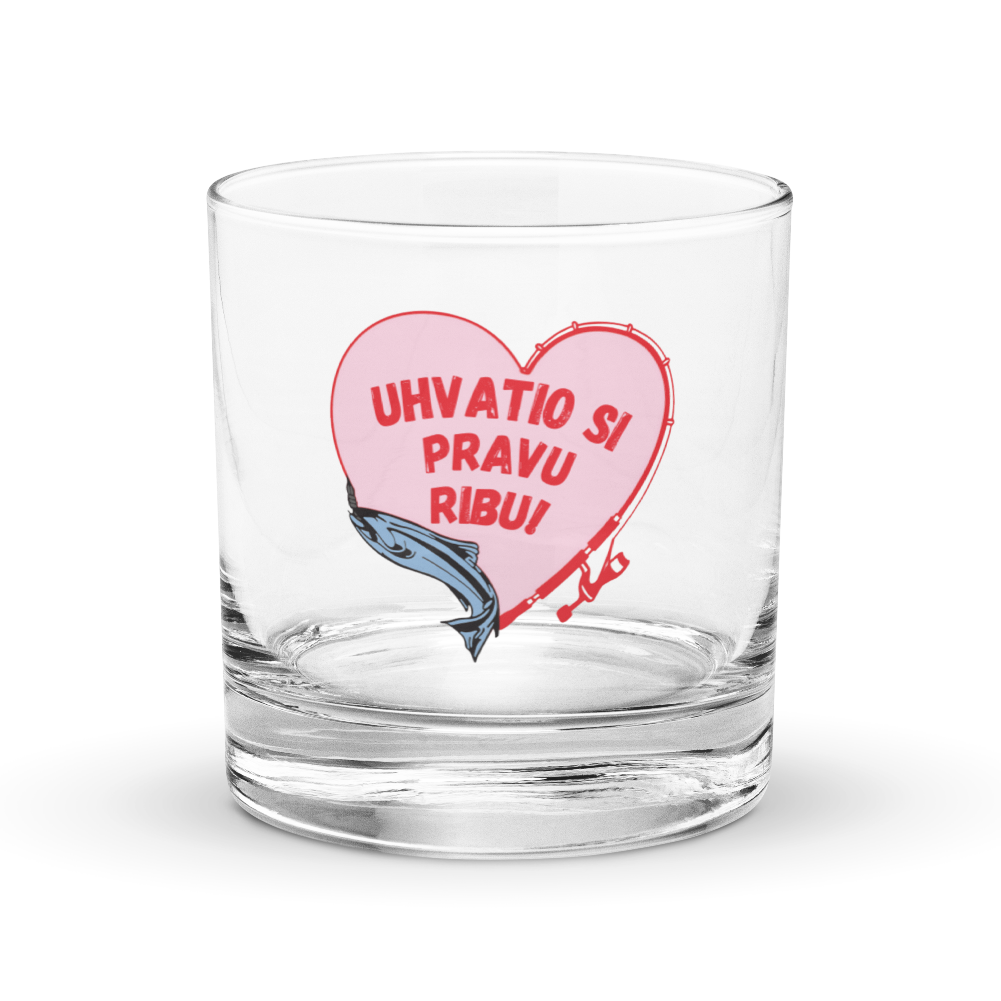 Clear rocks glass with fishing heart design and Balkan phrase “Uhvatio si pravu ribu.”