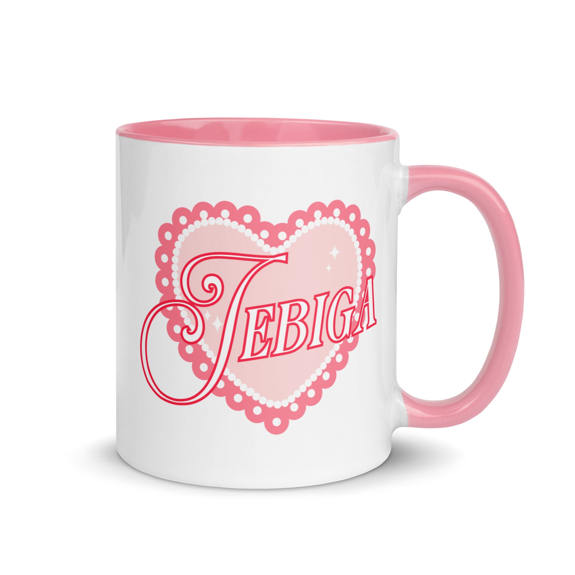 White mug with pink handle featuring the word “Jebiga” inside a pink lace heart.