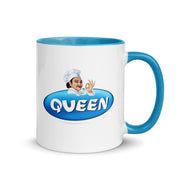 White mug with blue handle featuring a chef illustration and the word “Queen” inside a blue oval logo.