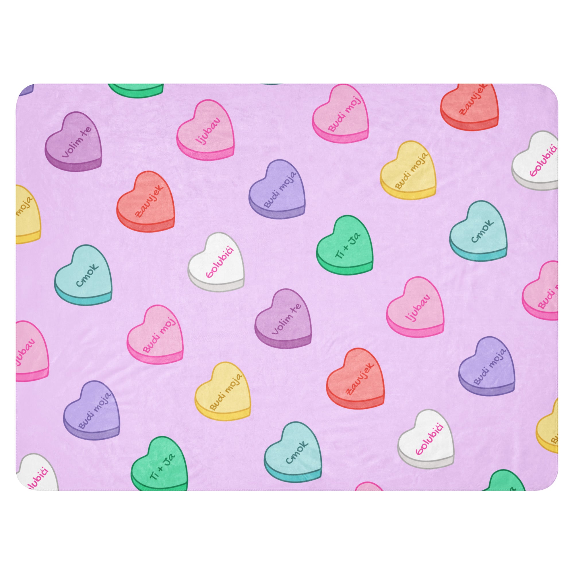 Lavender blanket with colorful sweetheart candy hearts and Balkan love phrases.