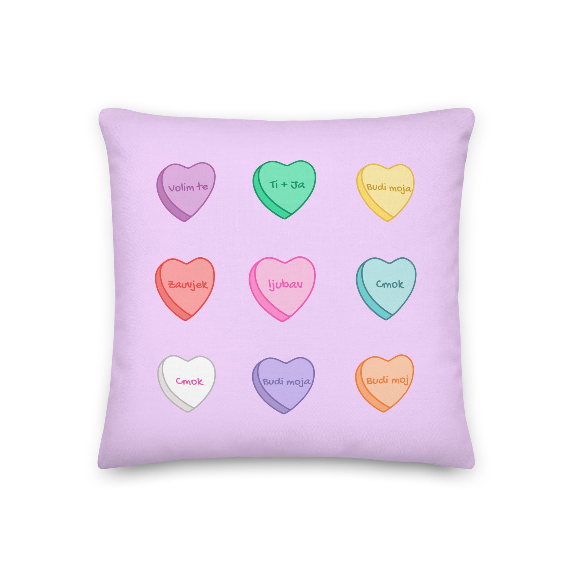 Candy heart pillow featuring Balkan love phrases in Sweethearts style