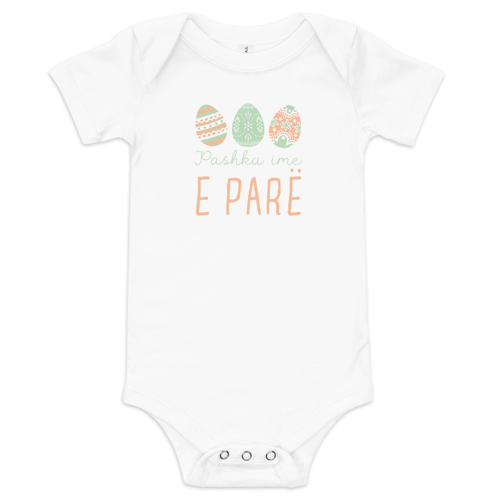 Albanian baby bodysuit with pastel Easter eggs and the phrase “Pashka ime e parë” meaning My First Easter in Albanian
