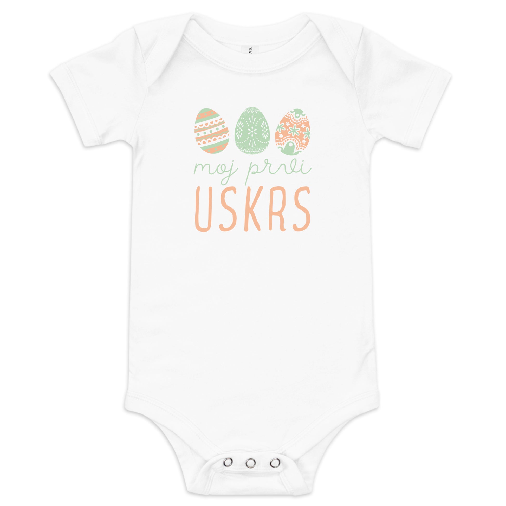 Baby bodysuit with pastel Easter eggs and the phrase “Moj Prvi Uskrs” meaning My First Easter in Serbian, Croatian and Bosnian