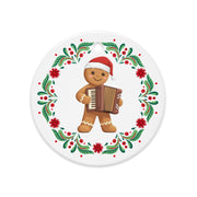Balkan gingerbread man ornament holding accordion with festive Balkan wreath.