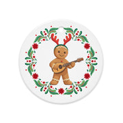 Balkan gingerbread man ornament playing tambura with Christmas wreath.