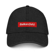 Balkan(ish) embroidered black denim hat with red patch and white lettering representing Balkan culture and diaspora identity