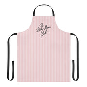 Pink striped apron with the phrase “The Balkan Moms Club”