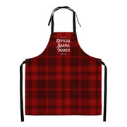 Balkan Christmas apron reading “Official Sarma Maker” on a red plaid background.