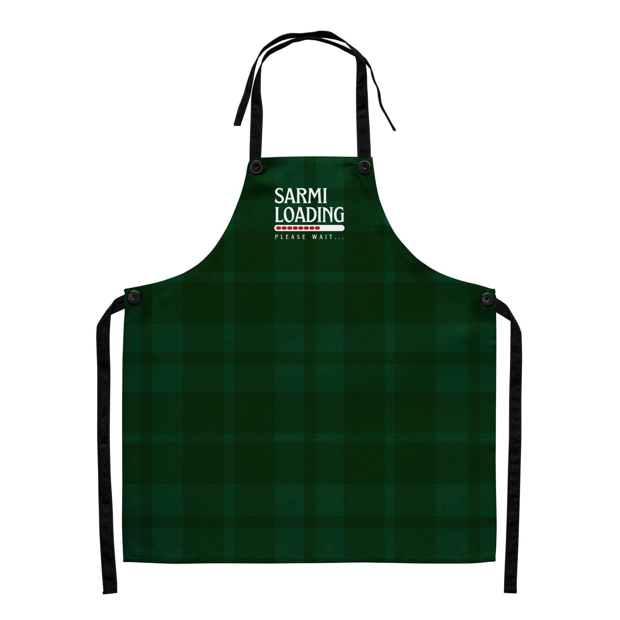 Bulgarian Christmas apron reading “Sarmi Loading,” green holiday plaid background.