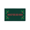 Serbian “Hristos Se Rodi” pillowcase with holiday holly and knitted-style text.
