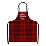 Romanian Christmas apron reading “Official Sarmale Maker” on a red plaid background.