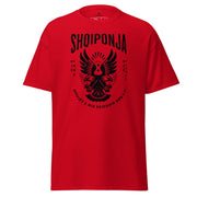 Red and black Albanian eagle shirt with the phrase “Rrënjët e mia rrjedhin kuq e zi.”