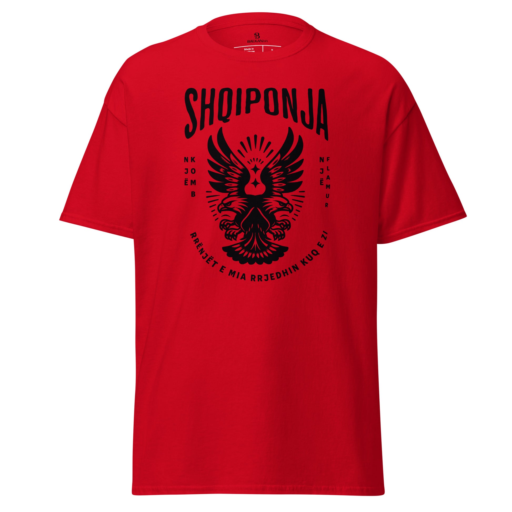 Red and black Albanian eagle shirt with the phrase “Rrënjët e mia rrjedhin kuq e zi.”