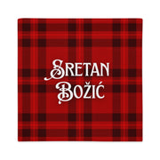 Croatian “Sretan Božić” pillowcase with red plaid holiday design.