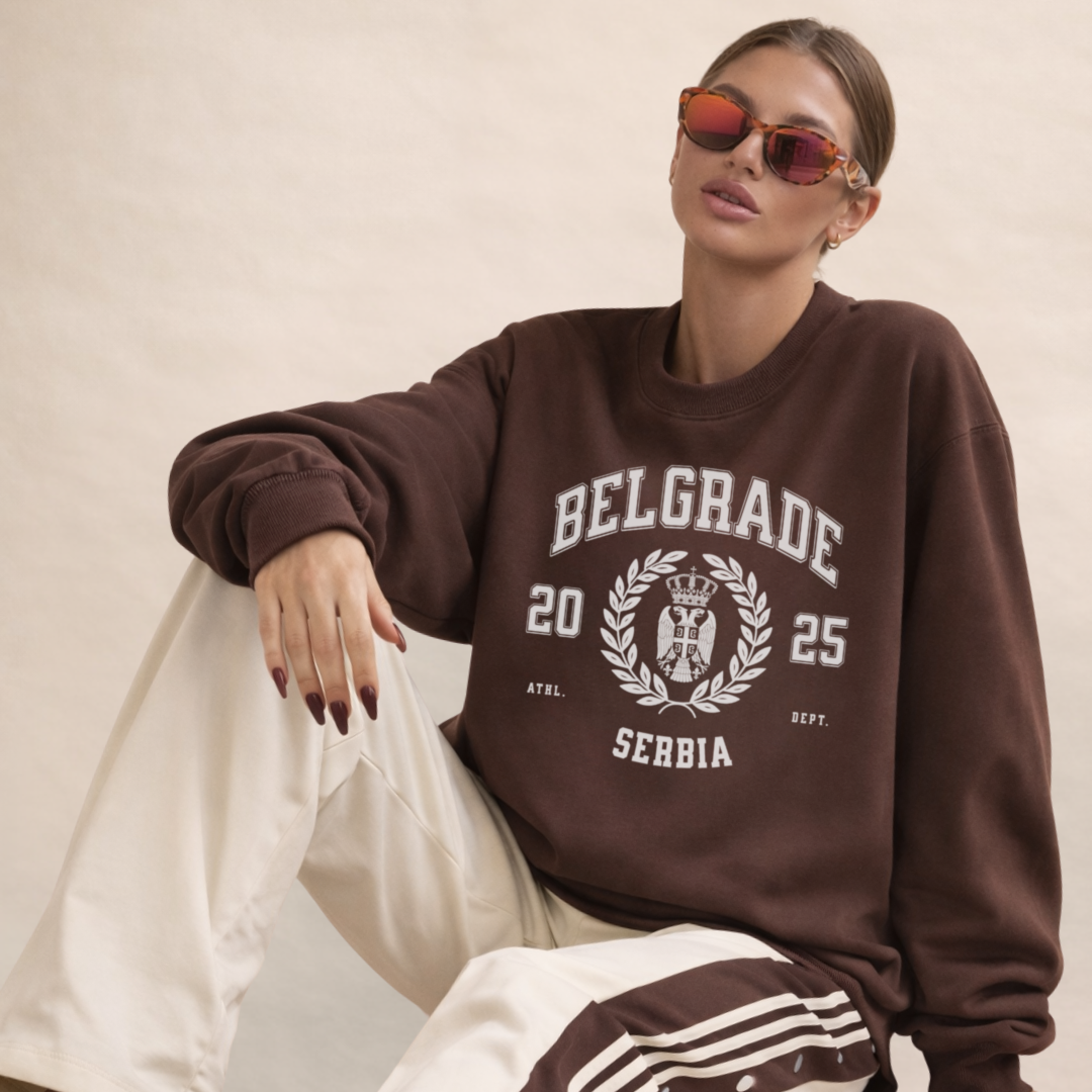 Woman wearing Belgrade Serbia varsity crewneck sweatshirt espresso brown