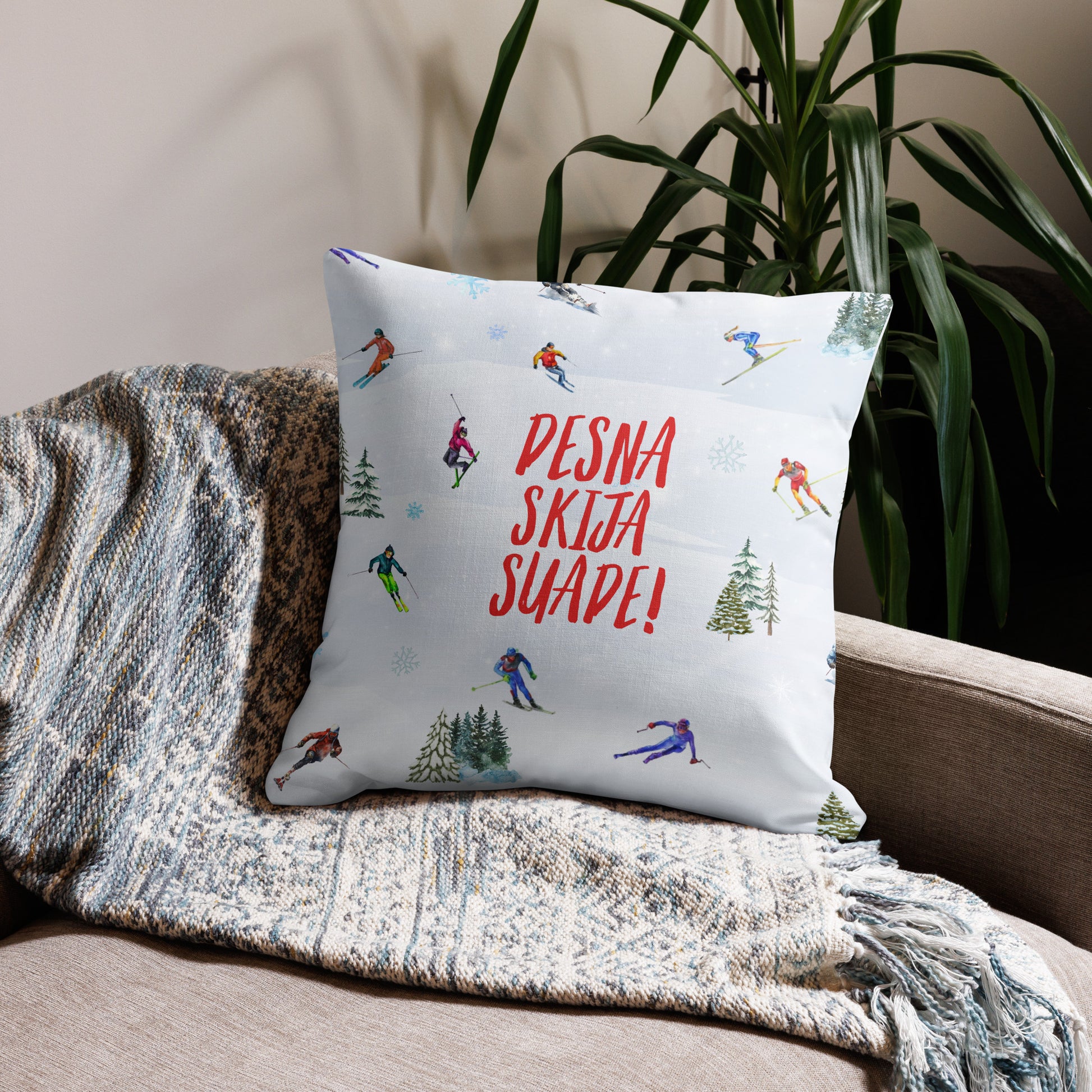Bosnian pillow case with text Desna Skija Suade and illustrated skiers – Balkanish design
