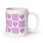 White mug with lavender checkered pattern and heart designs reading “Любов.”