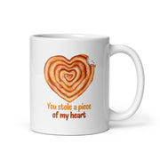 Ceramic mug with heart-shaped burek illustration and text “Balkan Love Bite”