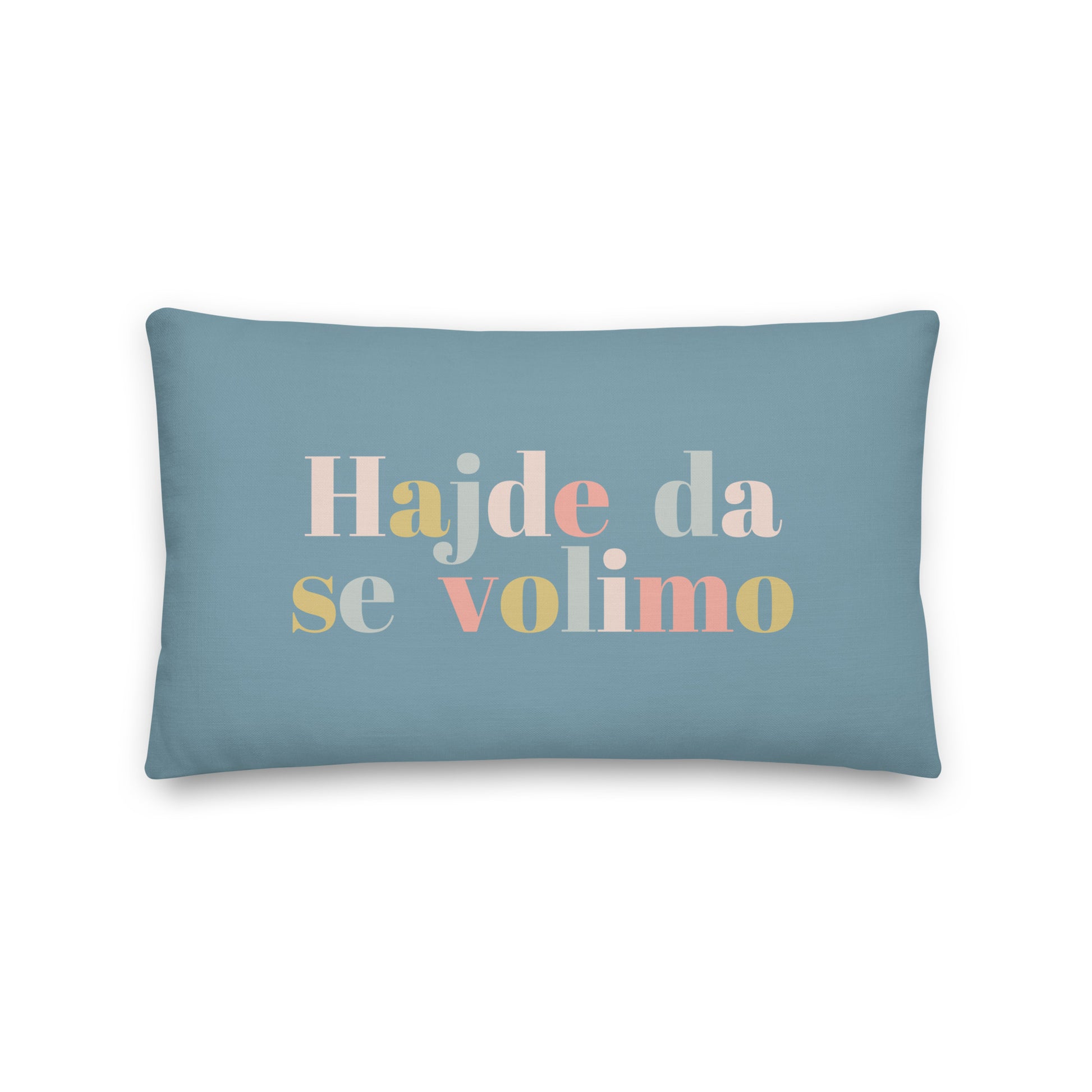 Balkan pillow with the phrase “Hajde da se volimo” in soft pastel lettering on a blue background, romantic home decor cushion