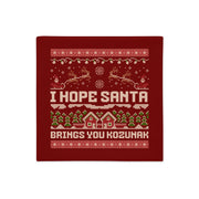Red knitted-style pillowcase with “I Hope Santa Brings You Kozunak” design.
