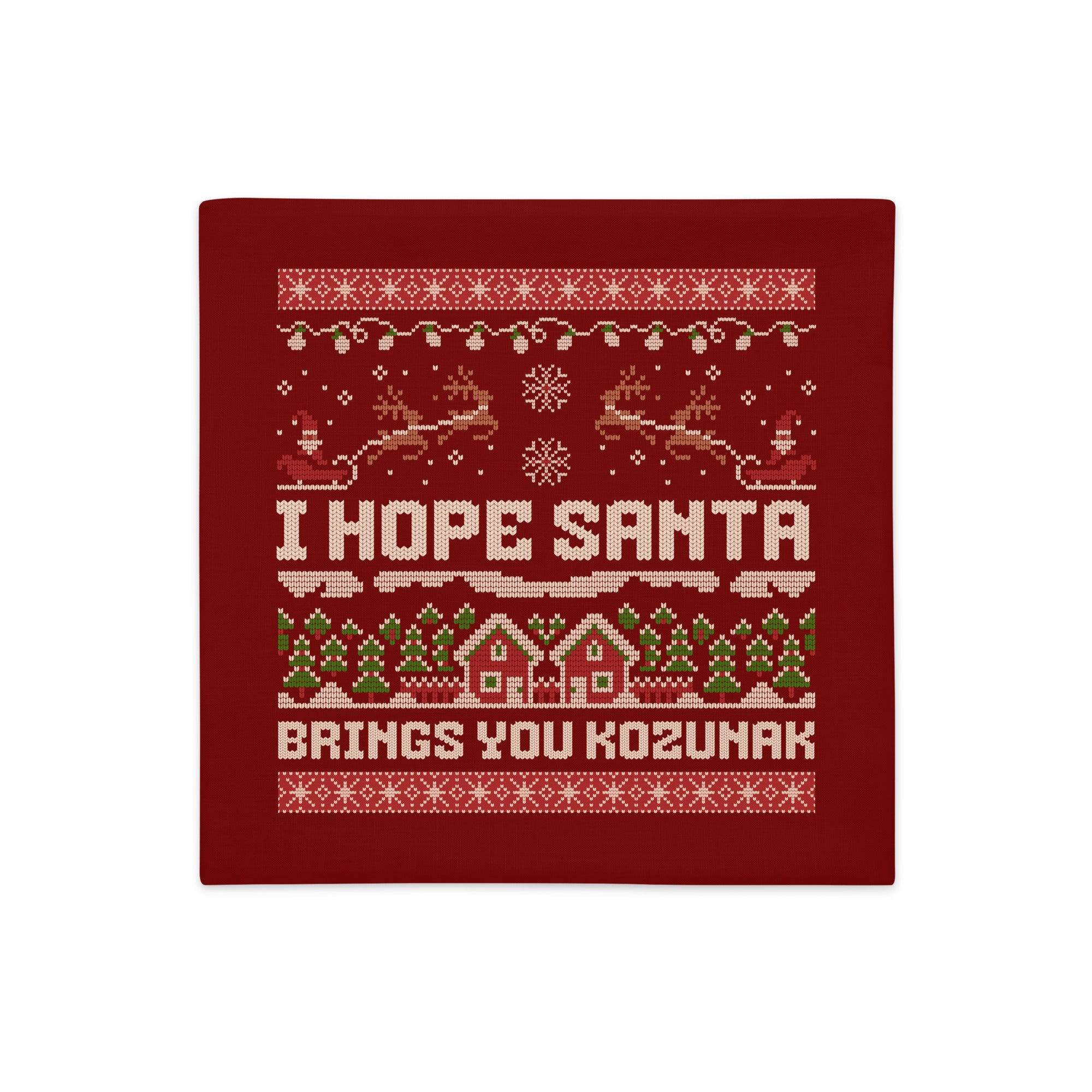 Red knitted-style pillowcase with “I Hope Santa Brings You Kozunak” design.