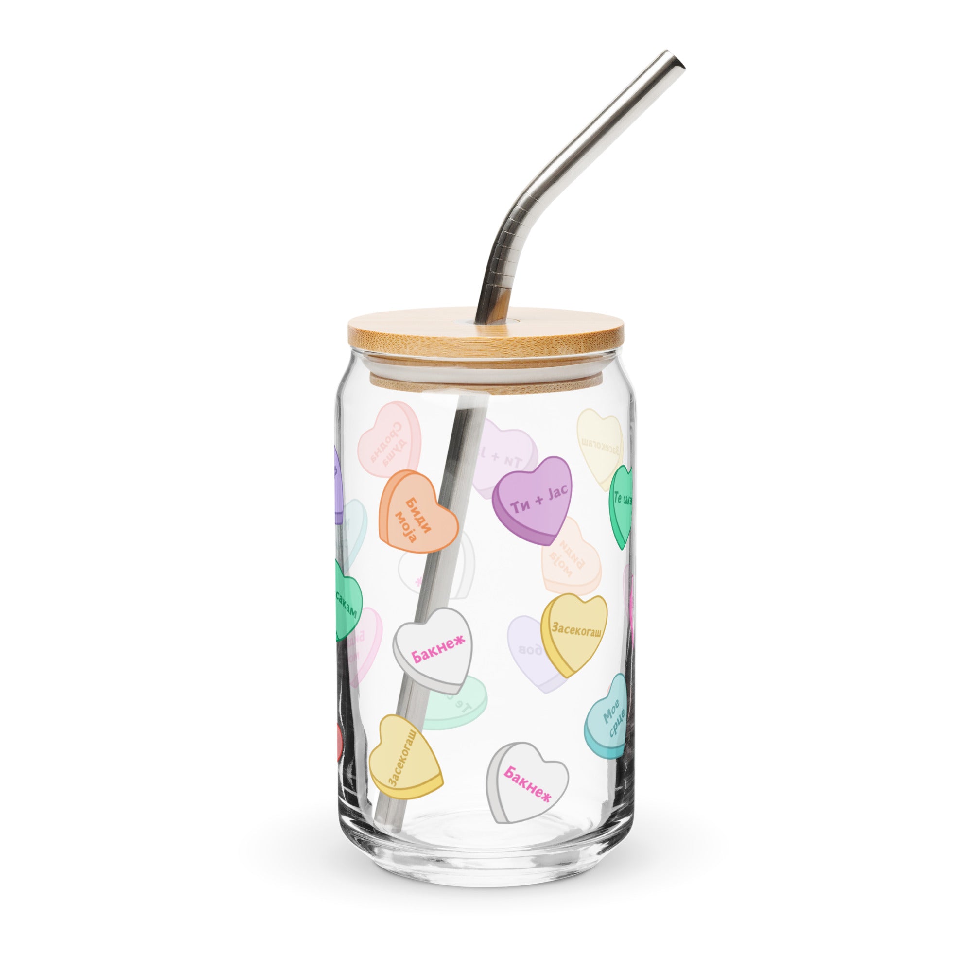 Glass can cup with sweetheart candy heart designs and love phrases.