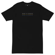 black shirt with made in kosovo text in kosovo flag colors minimalist design