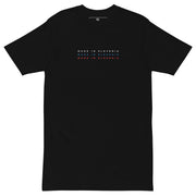 black shirt with made in slovenia text in slovenian flag colors minimalist design