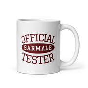 white mug with official sarmale tester text design in vintage red lettering