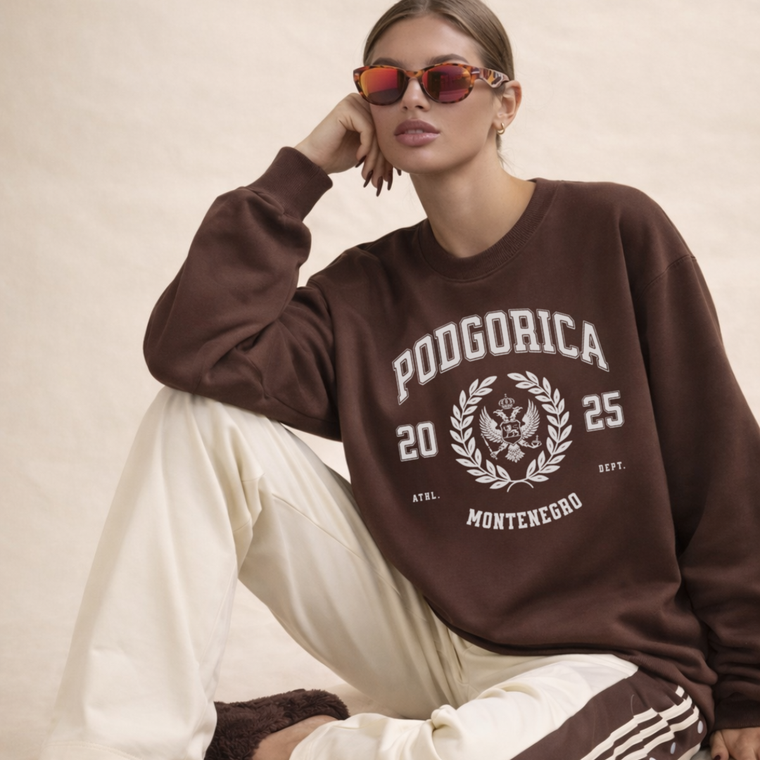 Woman wearing Podgorica Montenegro varsity crewneck sweatshirt espresso brown