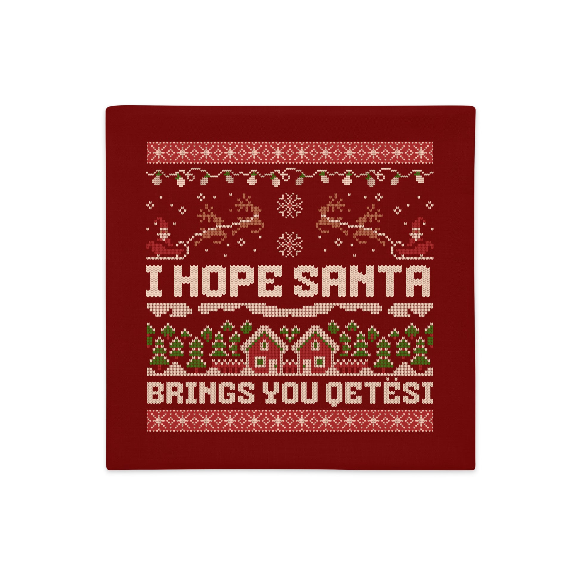 Red Christmas pillowcase with “I Hope Santa Brings You Qetësi” knitted-style text.