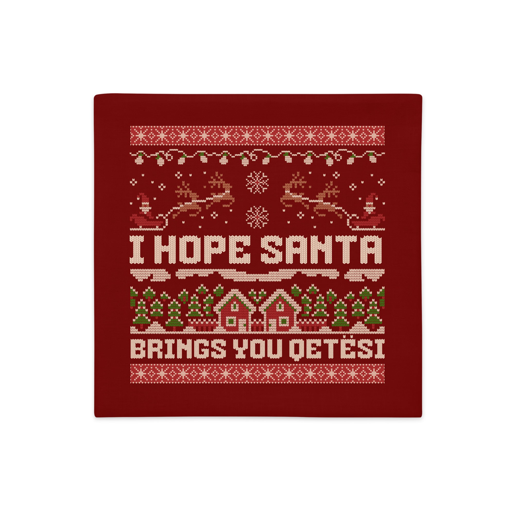 Red Christmas pillowcase with “I Hope Santa Brings You Qetësi” knitted-style text.