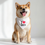 Dog wearing a bandana with 'I ❤️ MICI' text on a white background