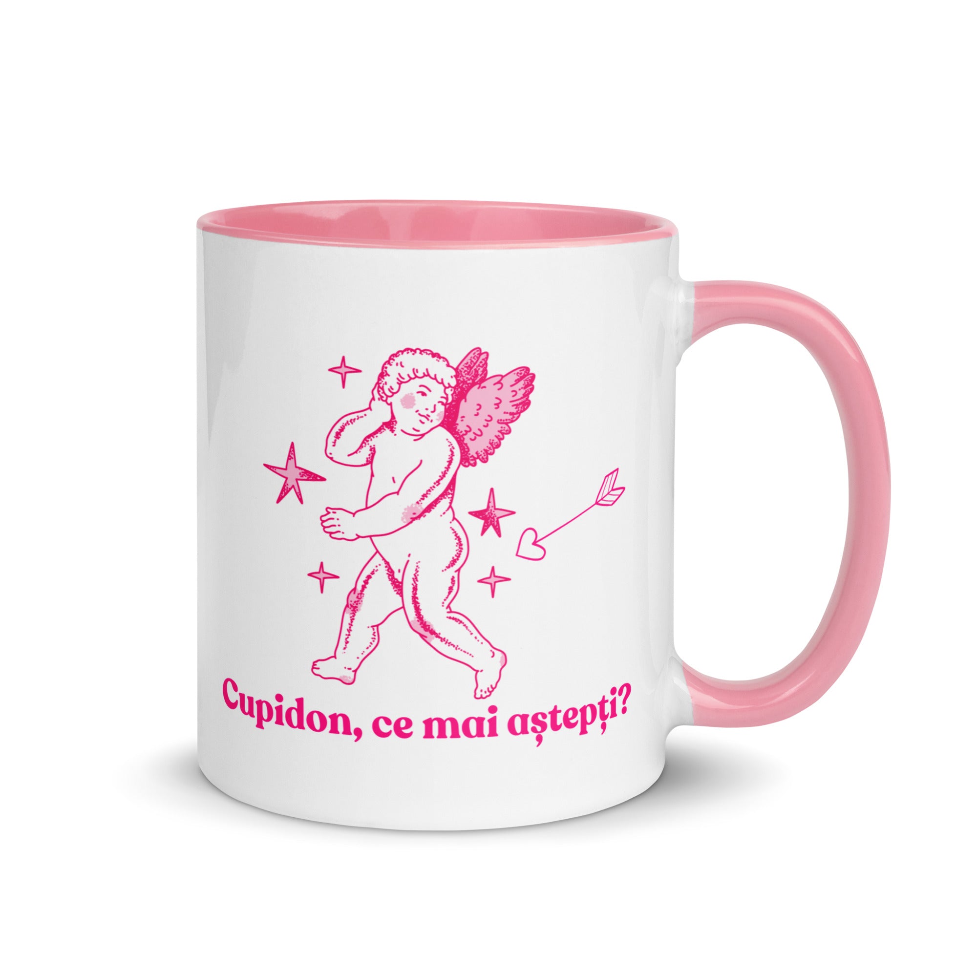 White mug with pink handle and interior featuring a cupid illustration and the Romanian phrase “Cupidon, ce mai aștepți?”