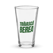 clear pint glass with green text Trăiască Berea