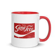 White mug with red interior and handle featuring a vintage “Enjoy Sarajevo” design.