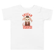 Toddler shirt with bunny wearing traditional clothing and the phrase “Srećan Uskrs” meaning Happy Easter in Serbian