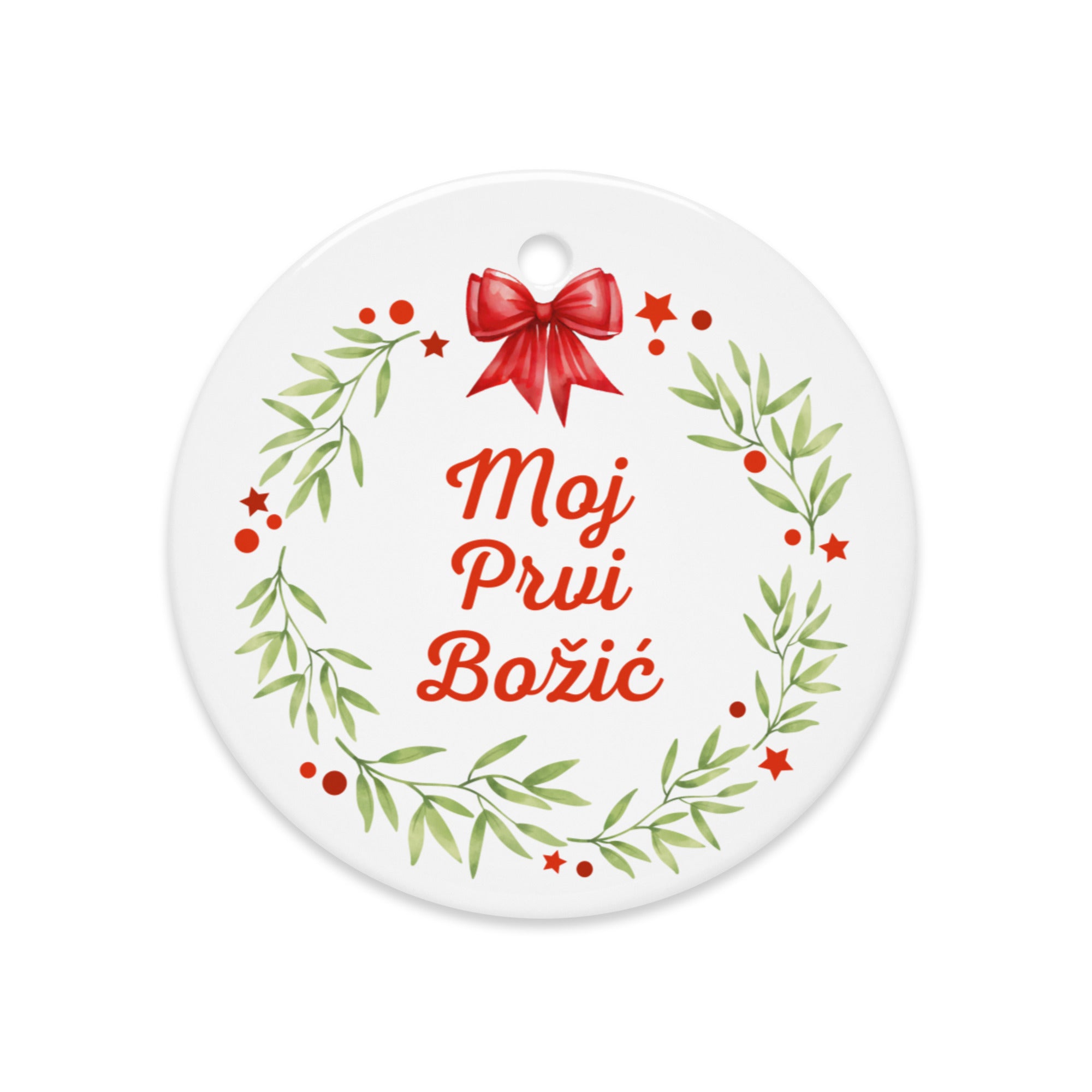 Wreath ornament with red bow and “Moj Prvi Božić”