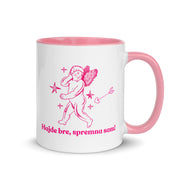 White mug with pink handle and interior featuring a cupid illustration and the Serbian phrase “Hajde bre, spremna sam!”