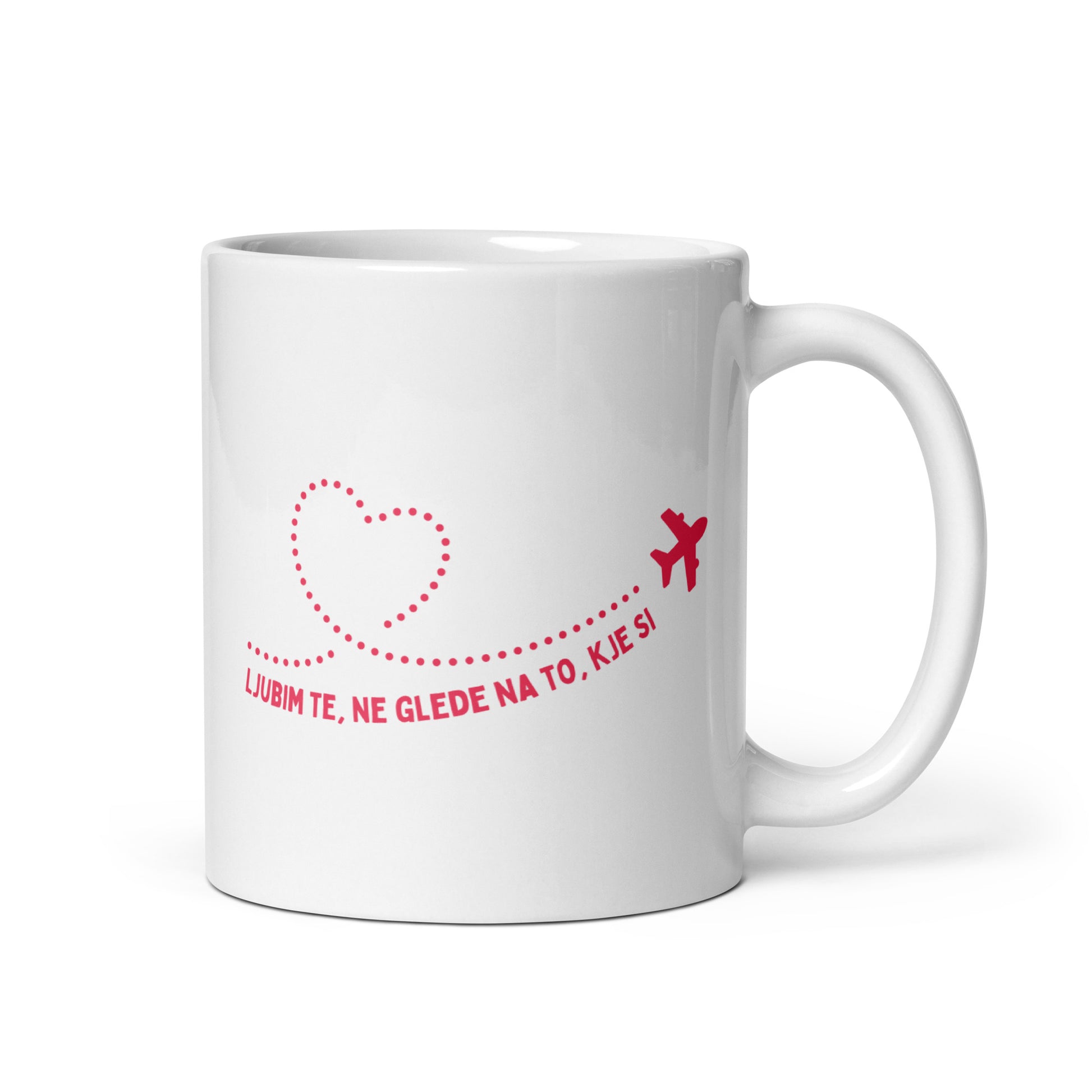 White mug with Slovenian text “Ljubim te, ne glede na to, kje si.”