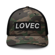 Slovenian Lovec camouflage trucker hat with embroidered white lettering and black mesh back