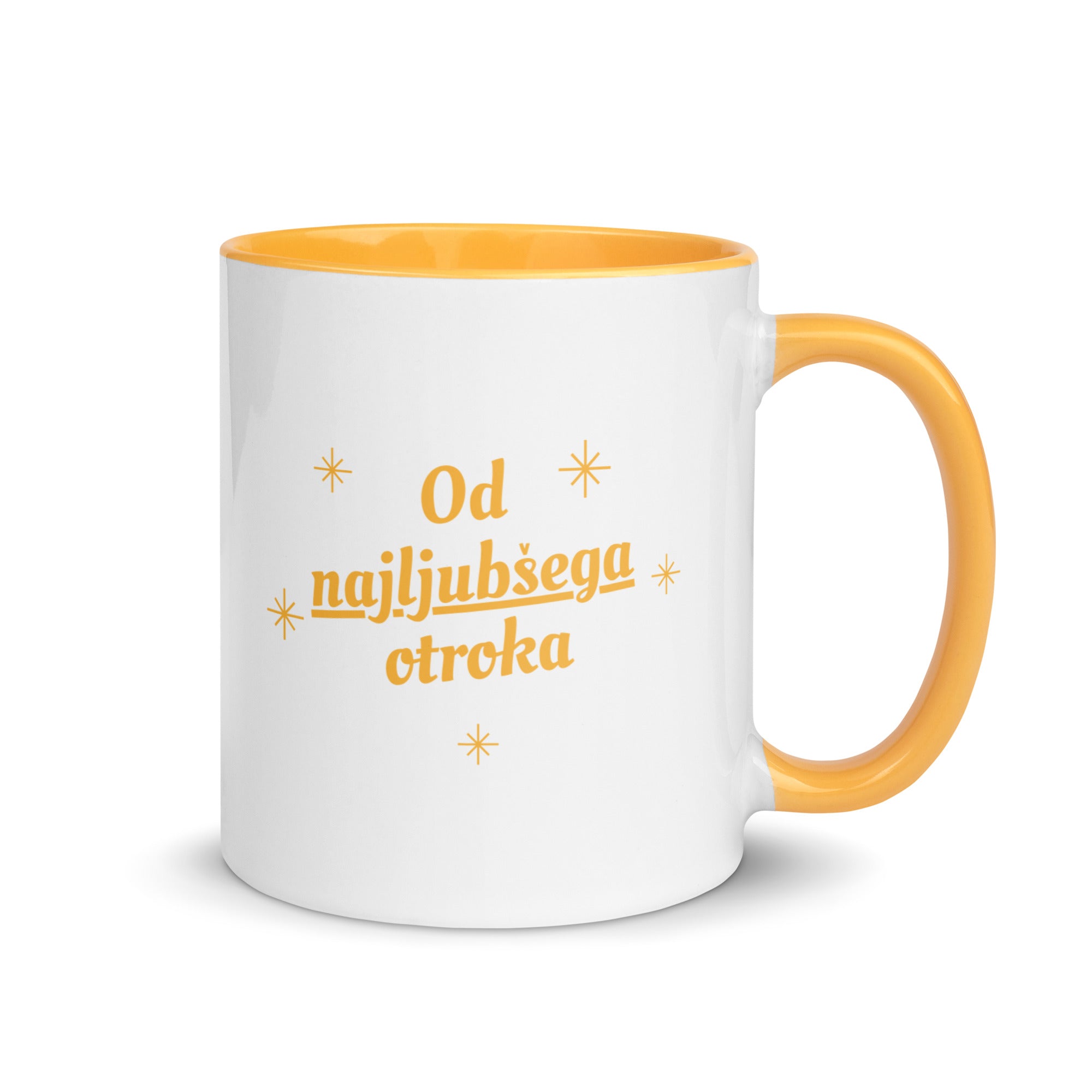 White mug with yellow handle reading “Od najljubšega otroka.”
