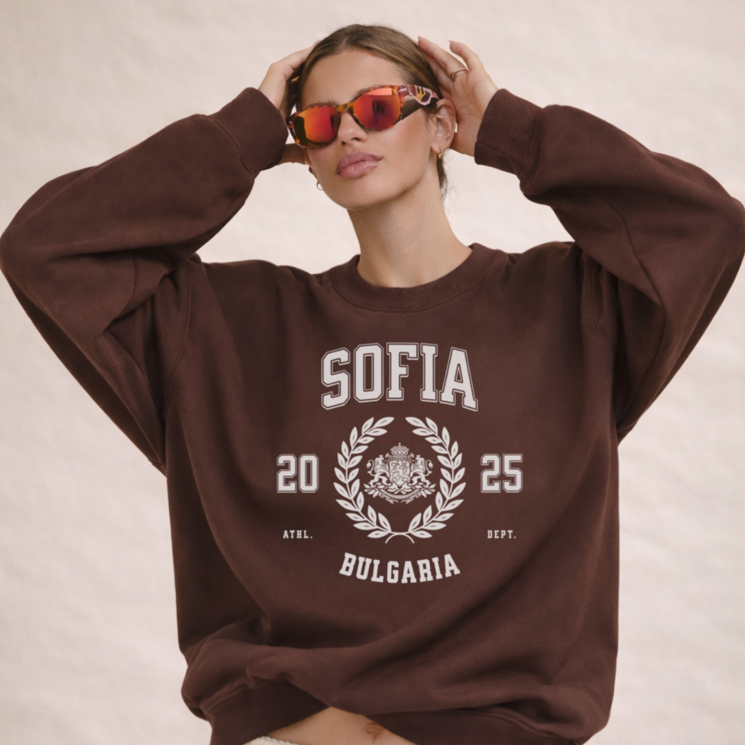 Woman wearing Sofia Bulgaria varsity crewneck sweatshirt espresso brown